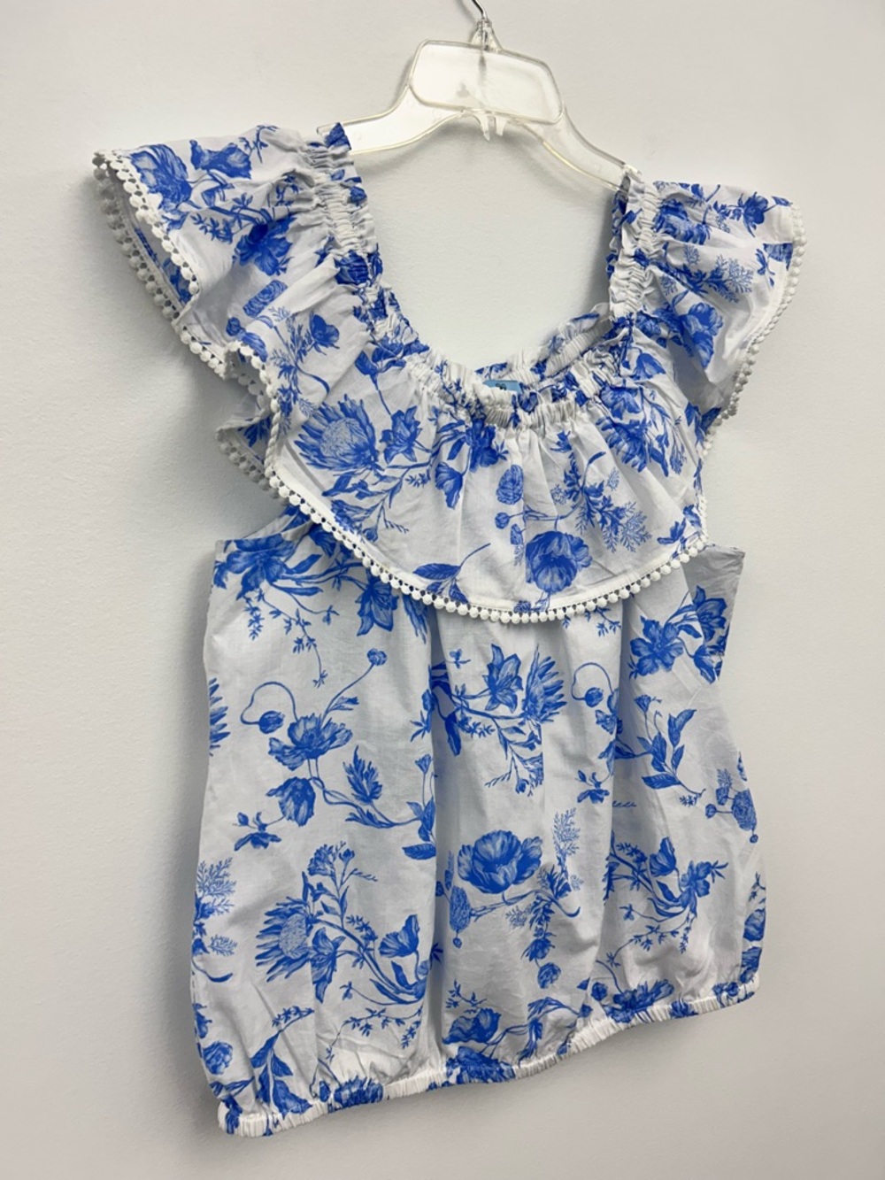 CeCe NWOT White Top with Blue Floral Print Ruffle Pom Pom Trim Size Large